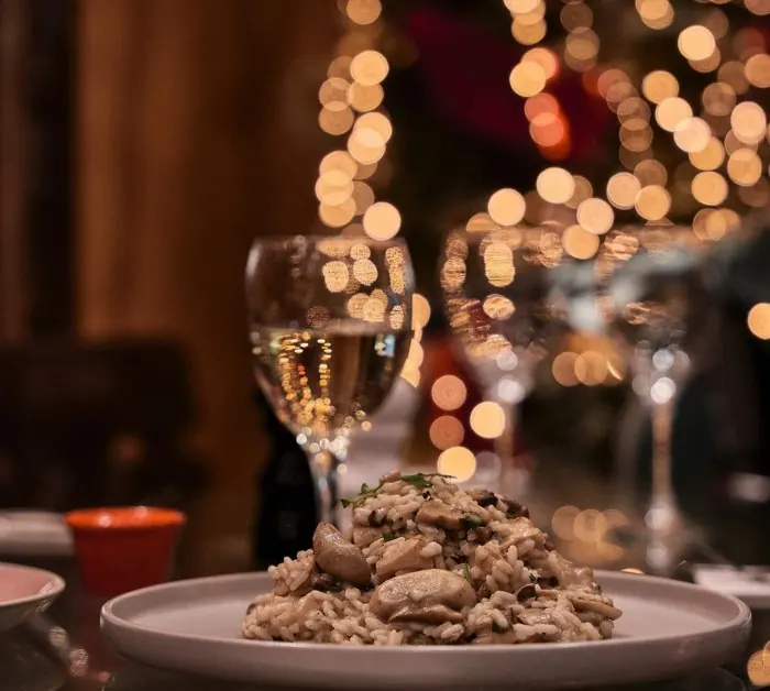 Mushroom risotto with warm festive lights