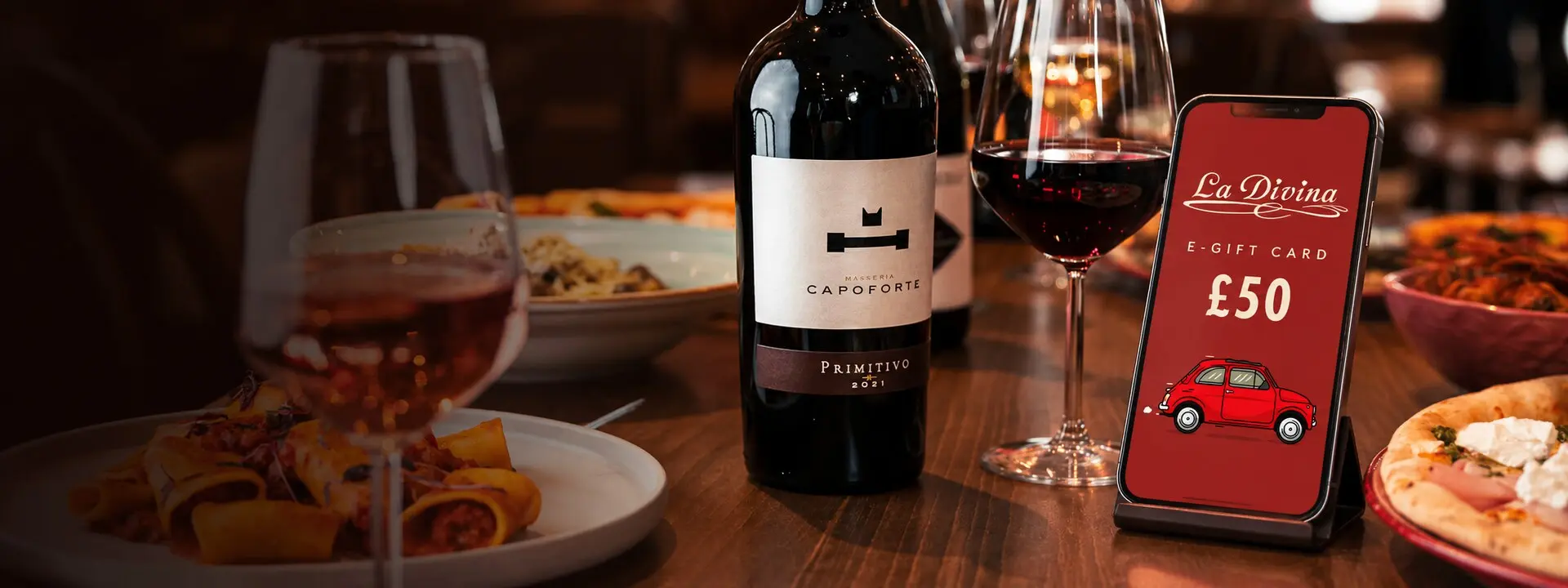 La Divina e-gift card presented with Italian food and wine