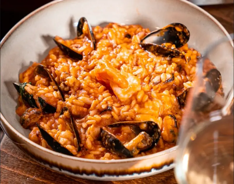 Seafood risotto served at La Divina Italian Restaurant