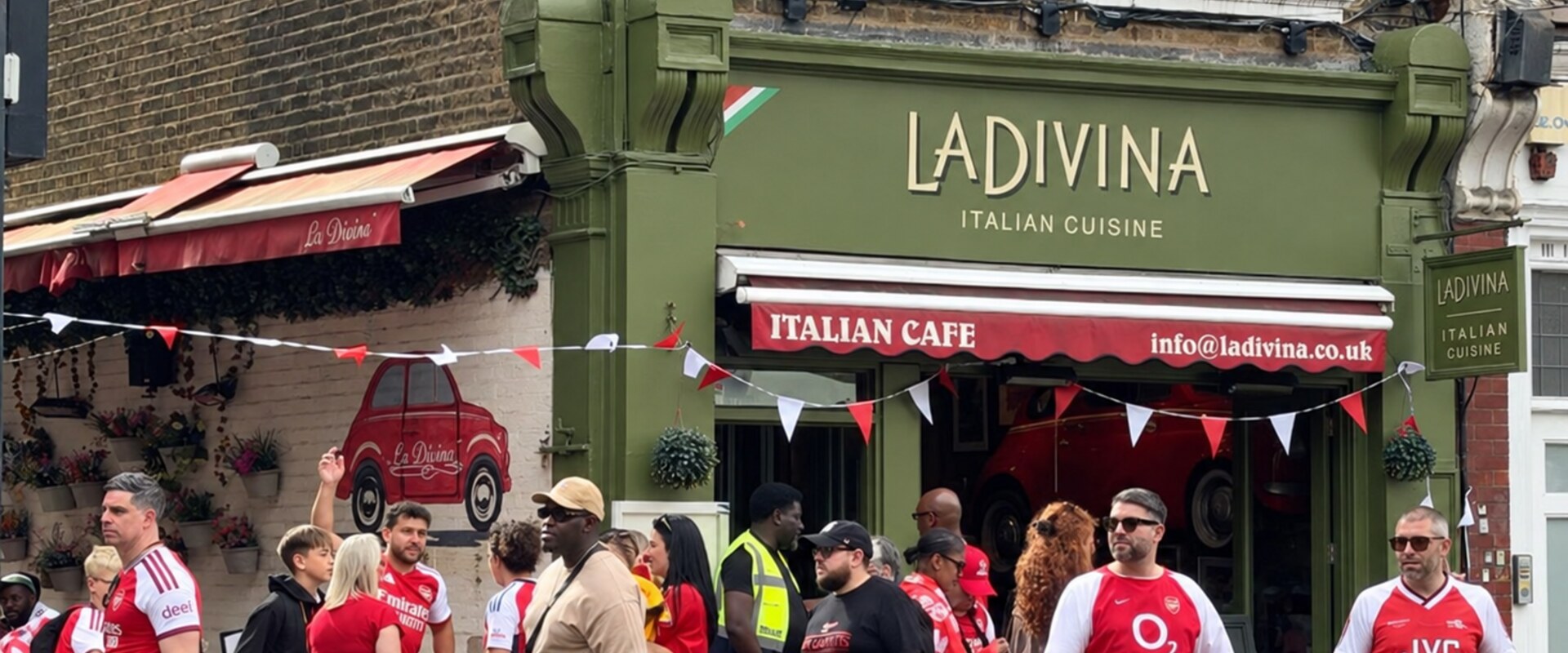 Arsenal supporters gathering outside La Divina Italian Restaurant on Upper Street